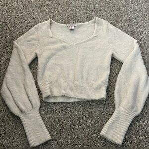 Women’s white fuzzy sweater